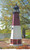 Amish handcrafted Barnegat replica wood garden lighthouse, 8 foot with base, finished in black, cherrywood, and white.