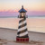 AZEK® PVC Cape Hatteras replica garden lighthouse, Amish crafted, 4 foot with base. Pictured at seashore at sunset.