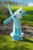 Amish crafted poly windmill, large, in aruba blue and white on lawn