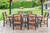 Poly dining table set from Seabreak Collection in black and mahogany.