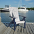 Amish crafted, engraved, poly adirondack chair on dock at yacht club
