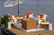 SeaAria Amish crafted poly ice pit stocked with refreshments for outdoor living space entertaining