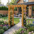 Amish crafted Covington cedar arbor pictured in modern home setting, finished in natural stain