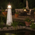 Amish made marblehead style wood garden lighthouse on garden path at dusk