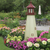 Amish crafted Cape May replica wood garden lighthouse pictured in a flower bed