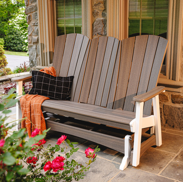Amish crafted triple glider with center console, pictured on porch.