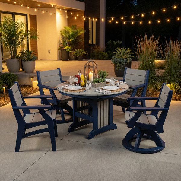 Amish crafted 48" round poly dining table pictured on the patio of a modern home at dusk. Pictured in patriot blue and light gray.