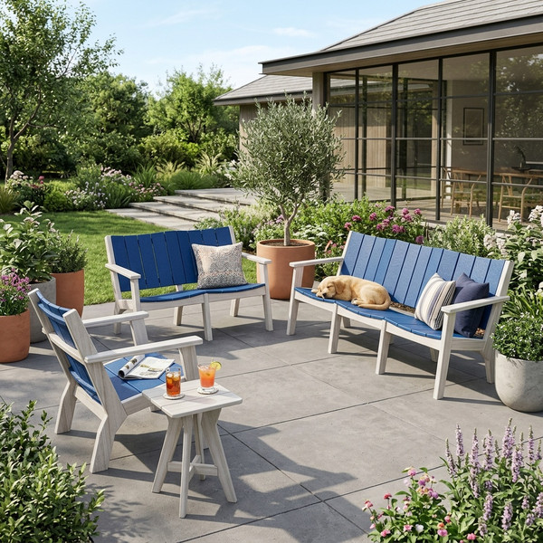 Amish crafted all-weather poly sofa in seashell and bright blue, pictured on patio of suburban home.