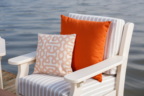 Egronomic ally designed poly chair sitting on a dock