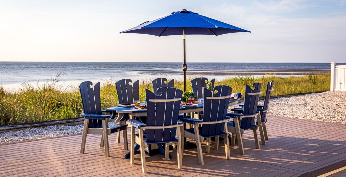 Amish made poly outdoor dining furniture on an oceanside deck.