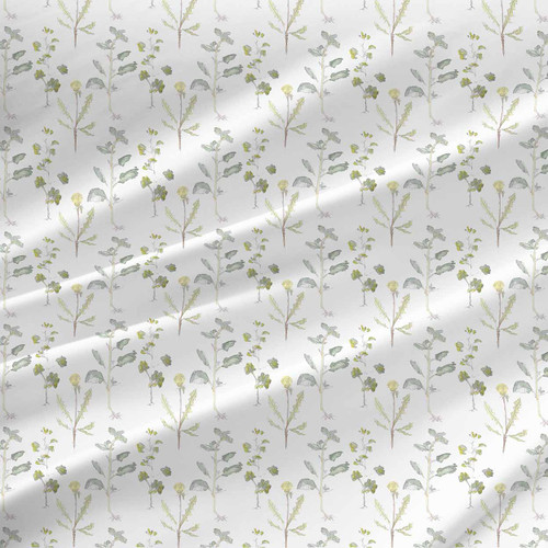 Elisa botanical fabric with soft green watercolor stems, small leafy sprigs, and delicate garden motifs on a light background.