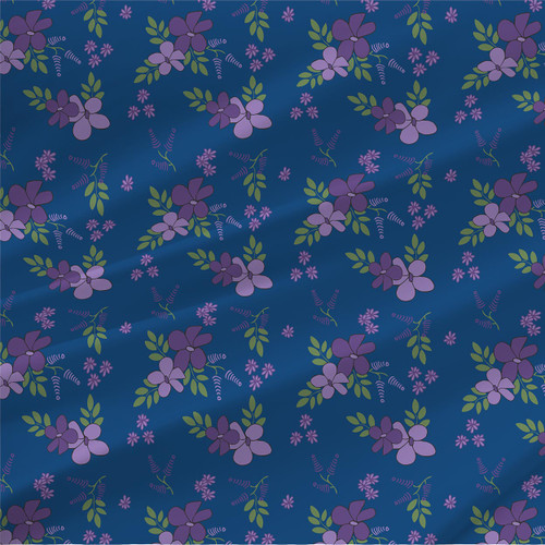 Delany Blue modern floral fabric by the yard with violet flowers and green leafy sprigs on a deep blue ground