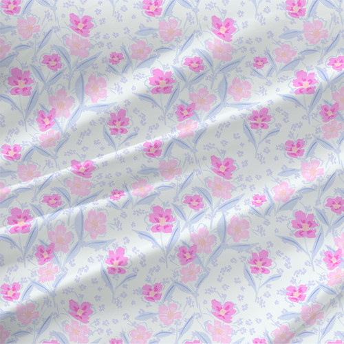 Ditsy Petals Violet small pink floral fabric by the yard with lavender-blue leaves on a pale ivory ground