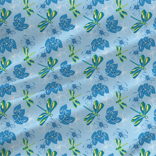 Blanche Blue dragonfly floral fabric with blue tropical flowers and green-striped dragonflies on a sky-blue background.
