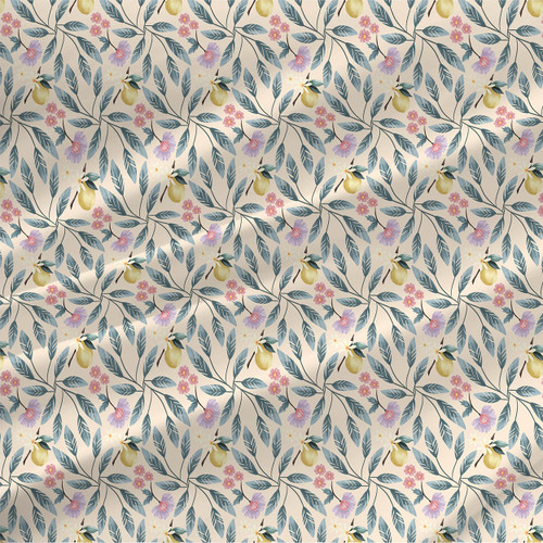 Lemon Fresh Sunlit Garden botanical fabric with yellow lemons, pastel flowers, and blue-green leafy stems on a warm light background