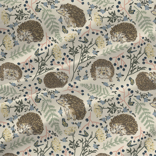 Hedgehogs in Garden fabric with brown hedgehogs, butterflies, blue flowers, navy berries, pink branches, and green foliage on a light cream background