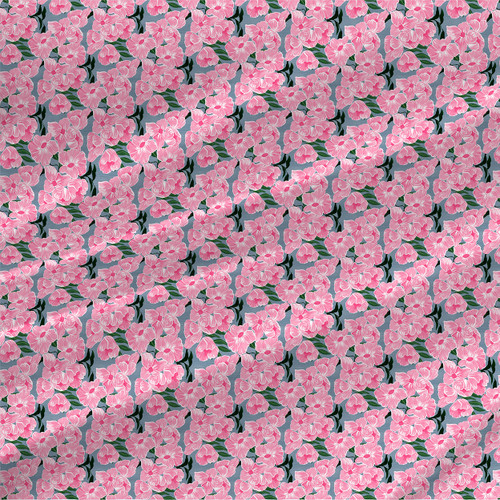 Serene Garden floral fabric by the yard with bright pink blossoms and deep green leaves on a muted blue-gray ground