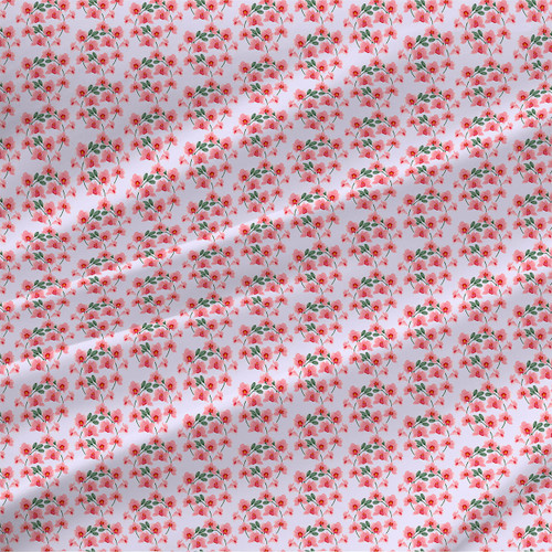 Gentle Orchids floral fabric by the yard with bright pink orchid blossoms and green leaves on a pale blush ground