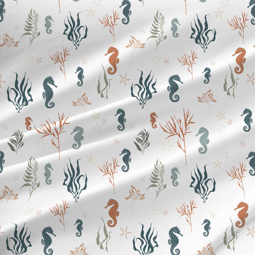 Seahorses coastal fabric by the yard with blue-gray, sage, rust, tan, and yellow sea life on white