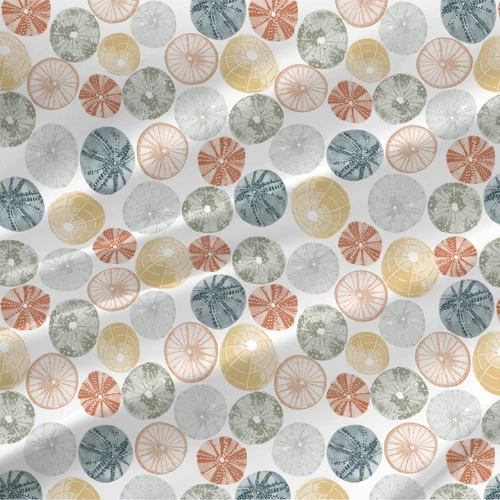Sea Urchin coastal fabric by the yard with terracotta, yellow, blue-gray, and green watercolor shell shapes on white