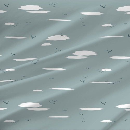 Sea Birds coastal fabric by the yard with white clouds and blue-gray birds on a soft blue ground