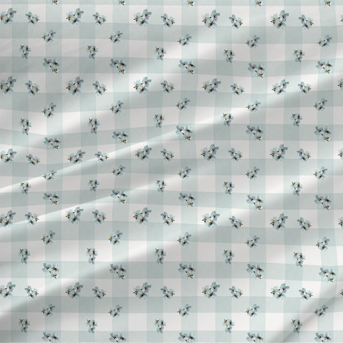 Blossom Gingham fabric in Lilac and Blue — A calm, airy gingham in soft blue with gentle lilac undertones and tiny blossoms—ideal for nursery projects, pajamas, patchwork, and breezy home decor.