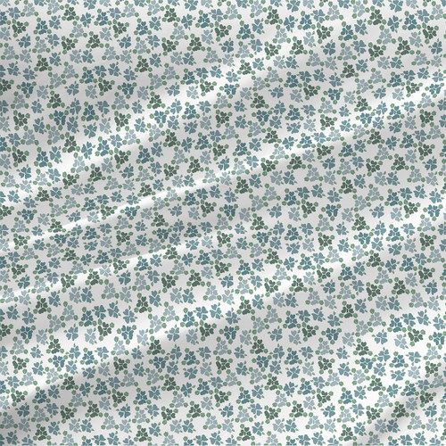 Lucy floral fabric in Seagreen colorway. A soft seagreen and pale blue tones for an airy, relaxed palette.