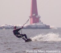 Steve riding near an icy pier
