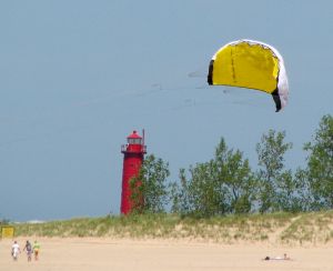 Learning to kitesurf with a trainer kite