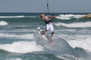 Damien LeRoy kitesurfing a tropical paradise