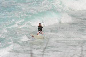Pete Cabrinha kiteboarding the waves in the Bahamas