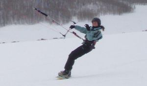 Snow kite in the harness which best suits your style
