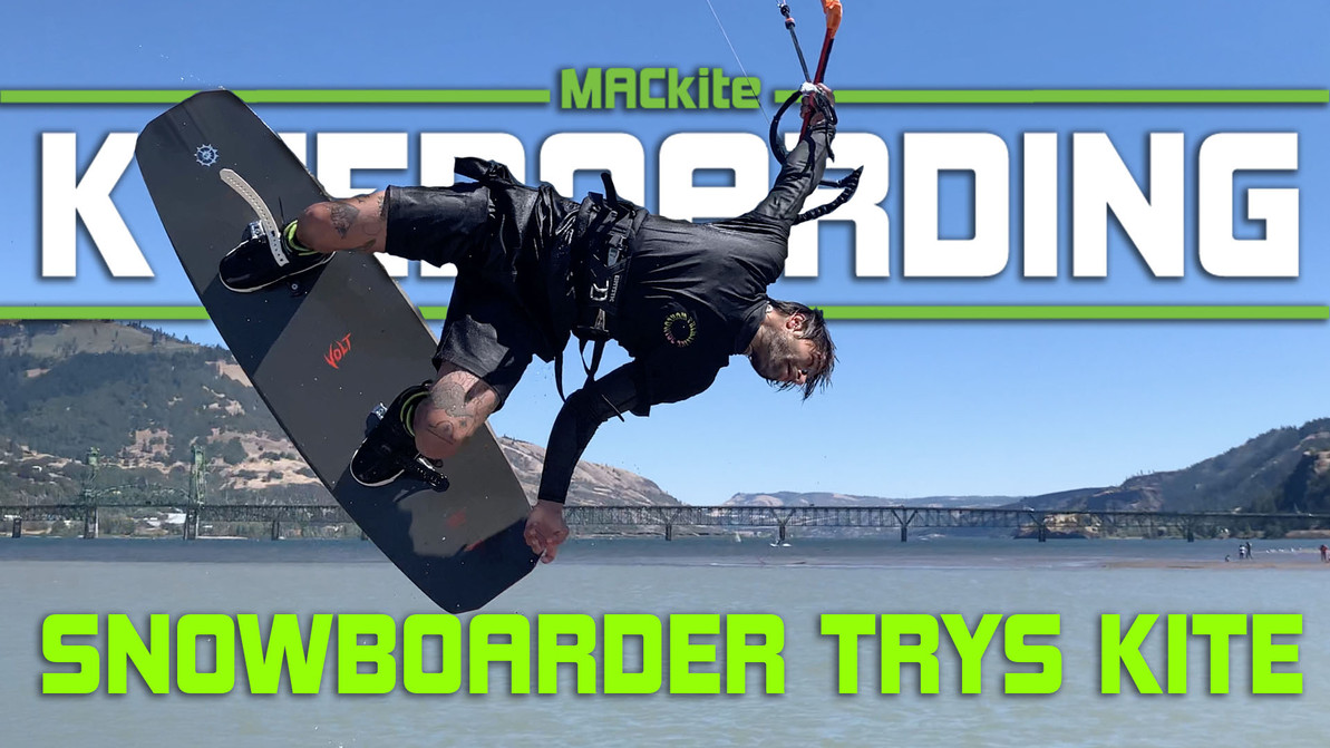 Snowboarder trys kite