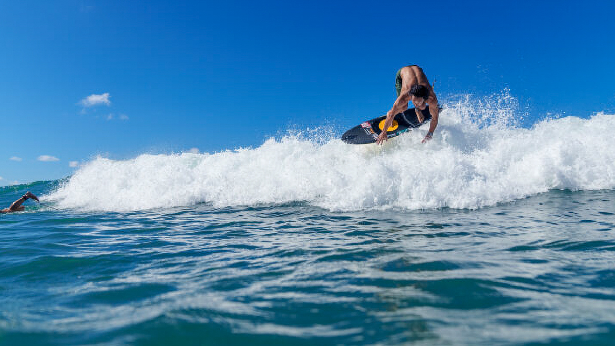 Surf foiler riding the waves on the 810X front wing