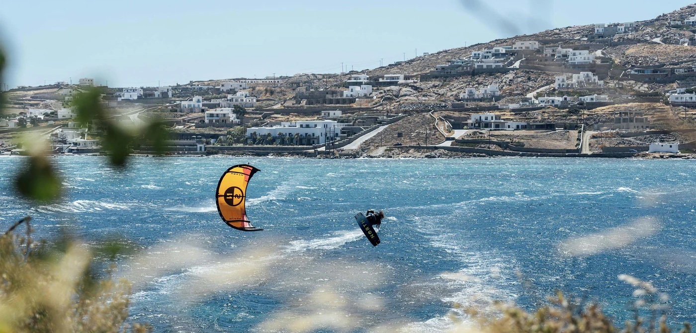 Shredding on the North Atmos 2026 twintip kiteboard.