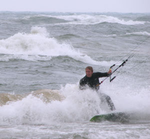 Kiteboarding in waves