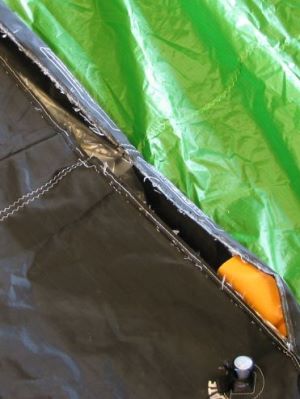 A rip in the kiteboarding kite's leading edge