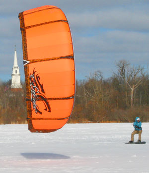 Snowkiting with a Cabrinha kiteboarding kite.