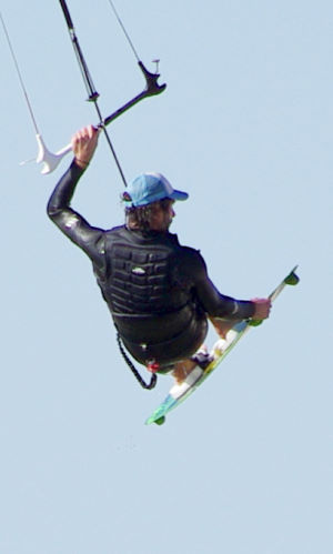 Wearing a kiteboarding flotation vest and still looking cool