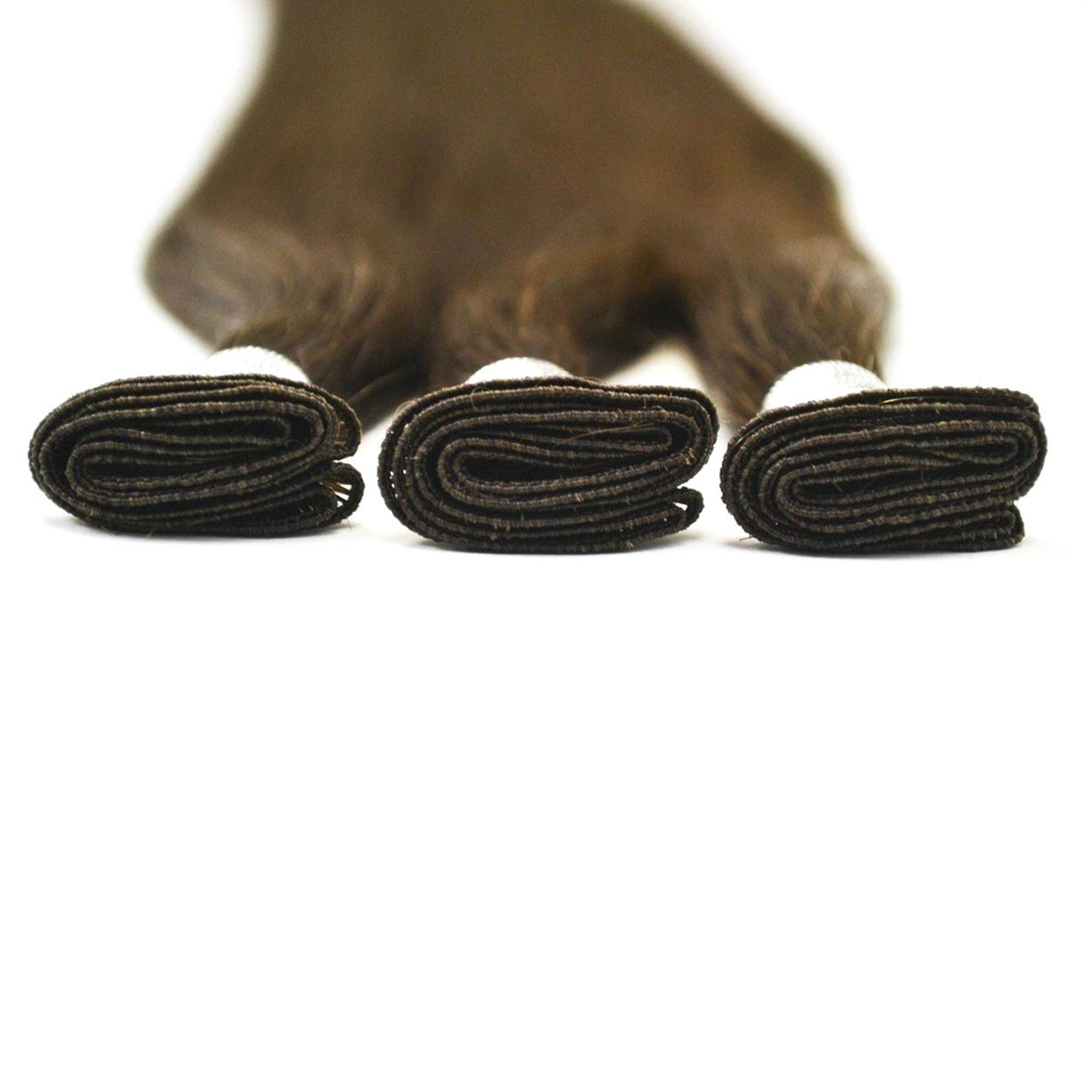 Machine tied weft hair extensions