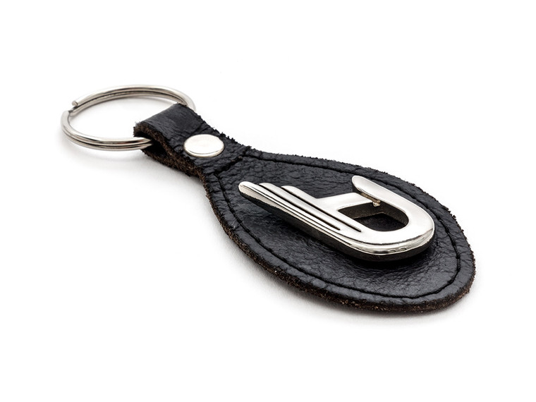 Handmade Leather Keychain featuring a riveted metal D-Logo.

A heavy-duty keychain that shouldn't be missing on any Duesenberg owner's keyring. Carry the Classic D-Logo with you everywhere you go.
Handmade in Canada.