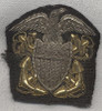 WWI US Navy Officer Hat Badge in Bullion with a Right-Facing Eagle