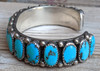 Lovely Vintage 1960s Navajo Silver Bracelet by Juliana Williams with 17 Sleeping Beauty Cabochons