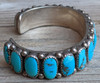 Lovely Vintage 1960s Navajo Silver Bracelet by Juliana Williams with 17 Sleeping Beauty Cabochons