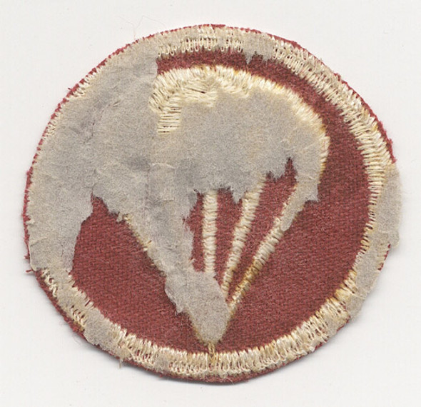 Early WWII US Army Parachute Field Artillery Cap Badge on Red Twill
