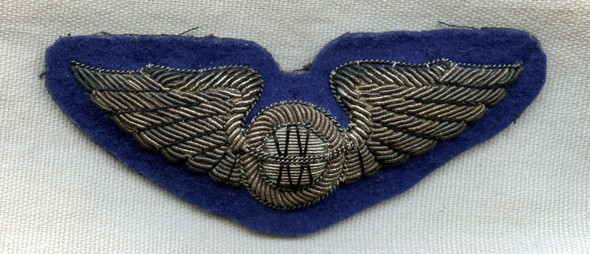 Beautiful WWII UK-Made USAAF Navigator Wing Bullion on Combat Blue Background