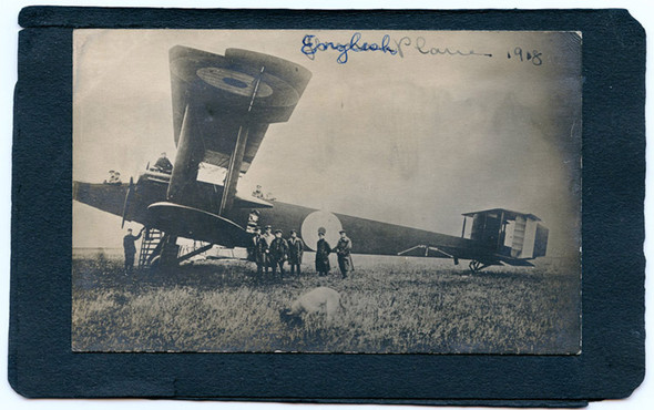 WWI Photo of What Appears to be Captured English Plane with Germans Posing with Aircraft