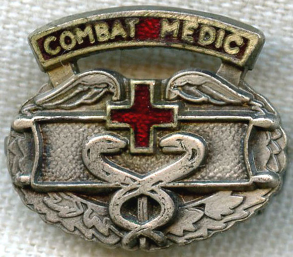 Great WWII Combat Medic Lapel Pin<p> NO LONGER AVAILABLE