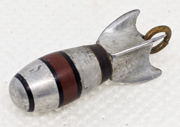 Cool WWII War-Worker Made Bomb Charm in Aluminum & Bakelite with brass ring at top