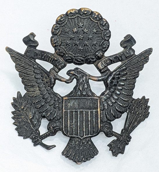 Scarce WWI US Army Officer Visor Hat Badge in Blackened Brass. Curved to fit Hat